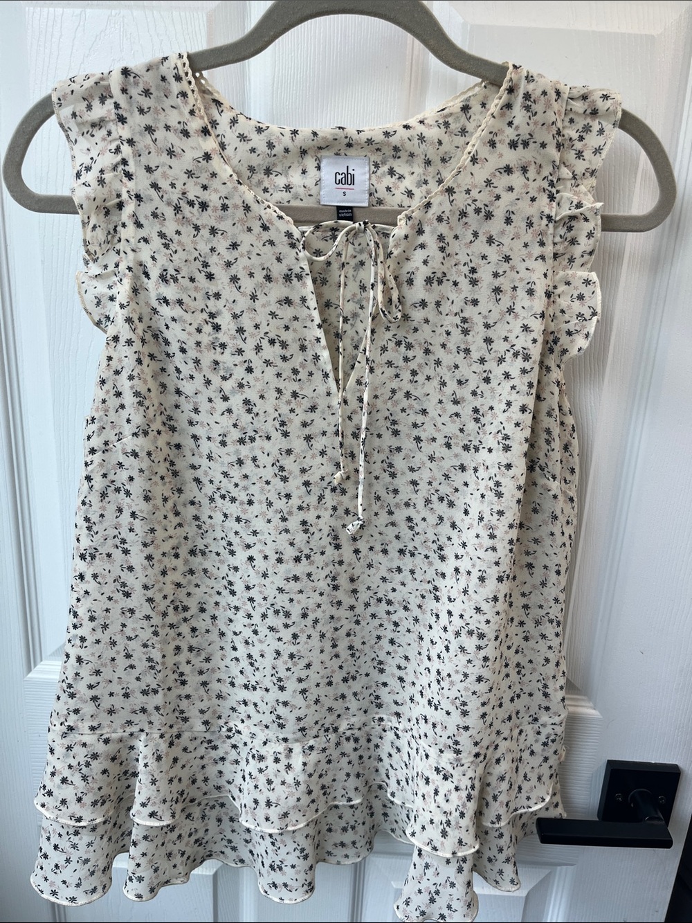 CAbi Cream Blouse with Black Floral Print and Ruffle Hem